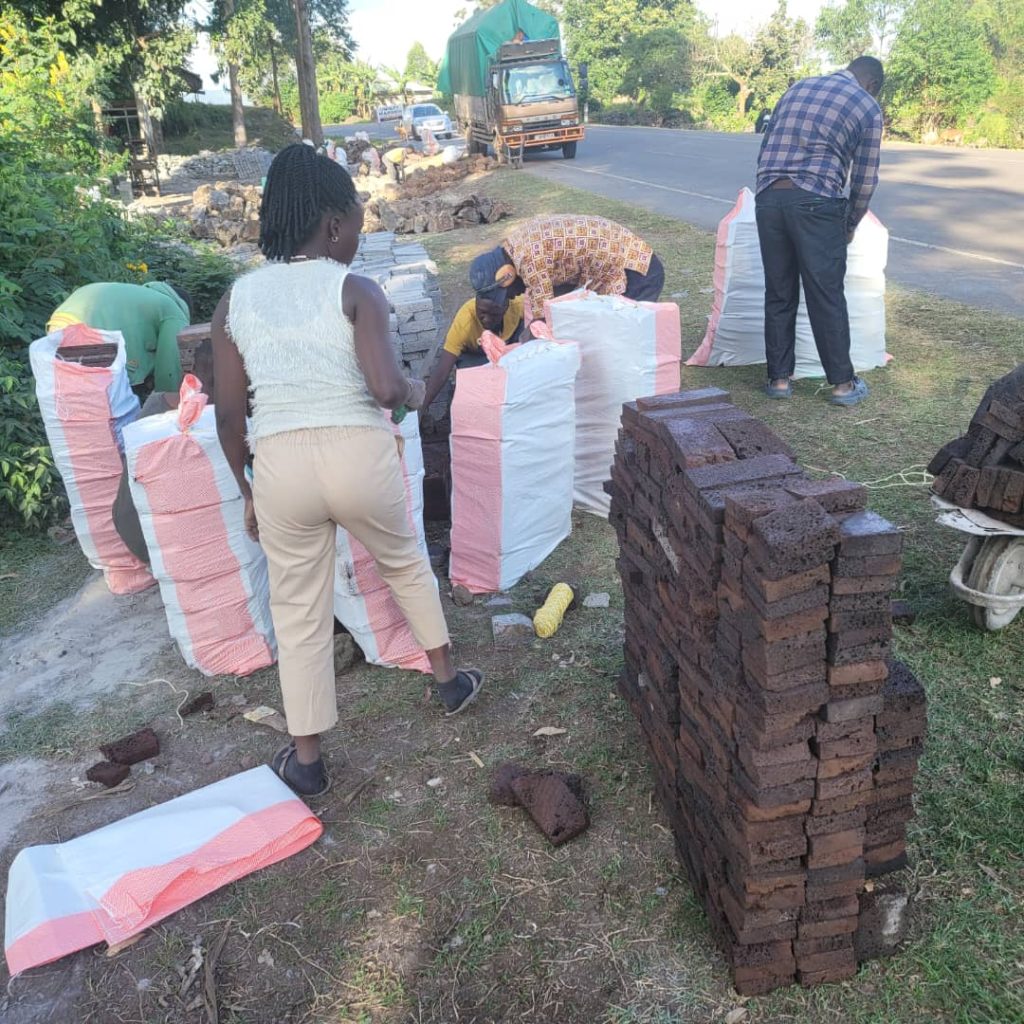 Clients packing products in sacks for construction